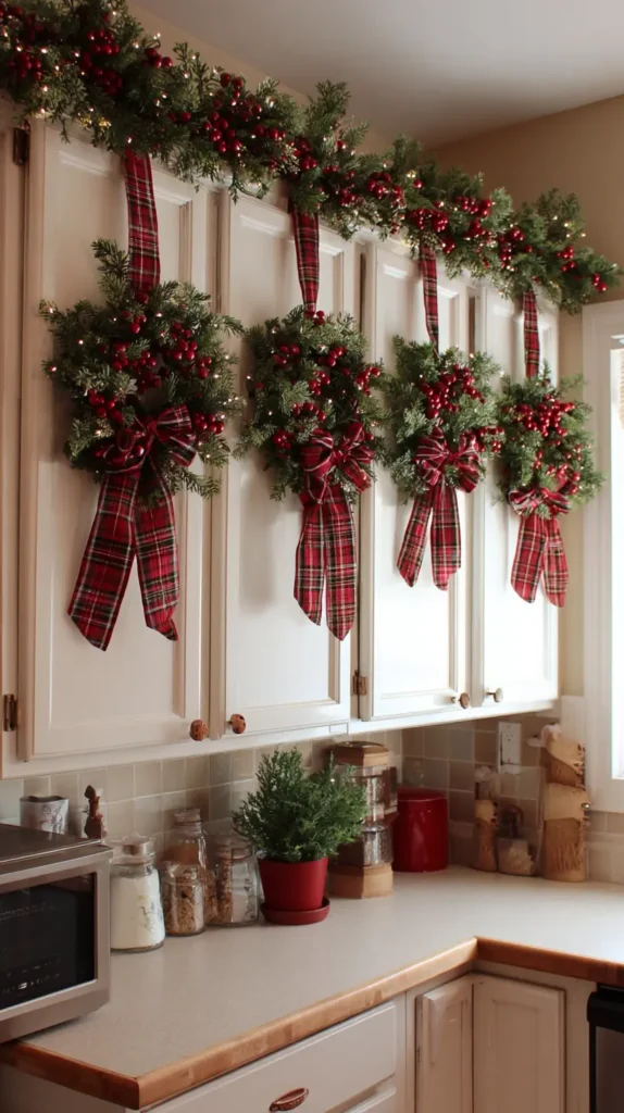 Hanging Mini Wreaths and Christmas Garland on Kitchen Cabinet Doors