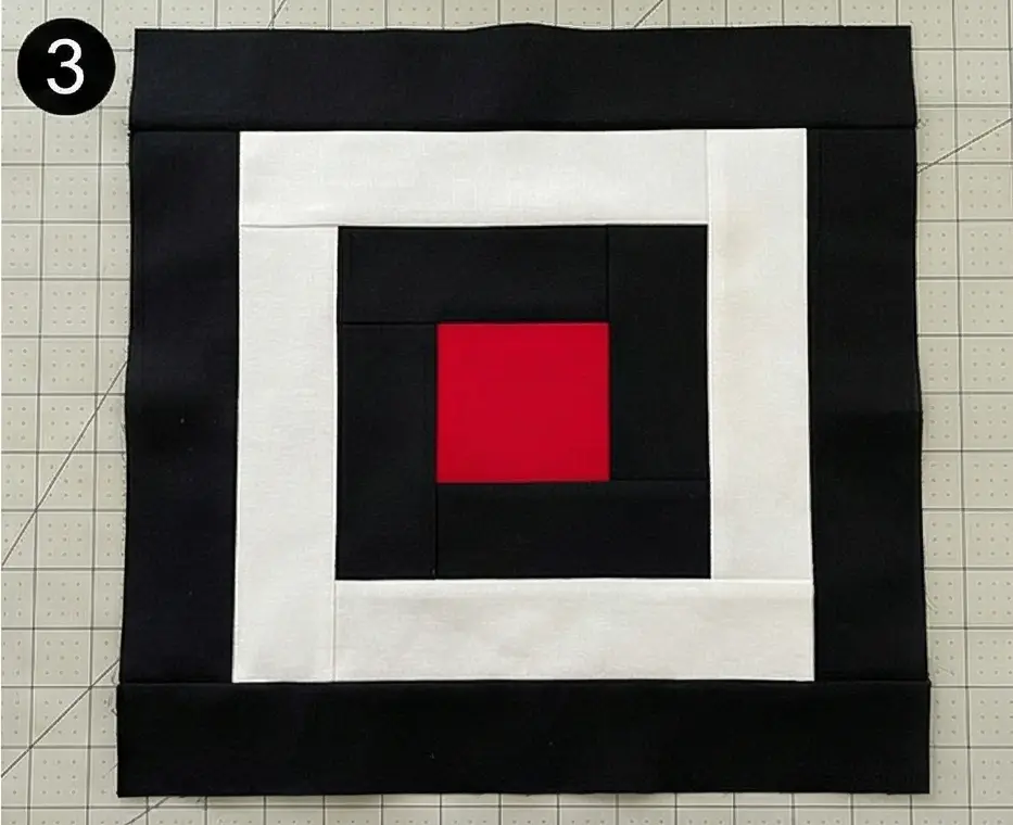 Bold Red, Black, and White Patchwork Quilt for Master Bedrooms