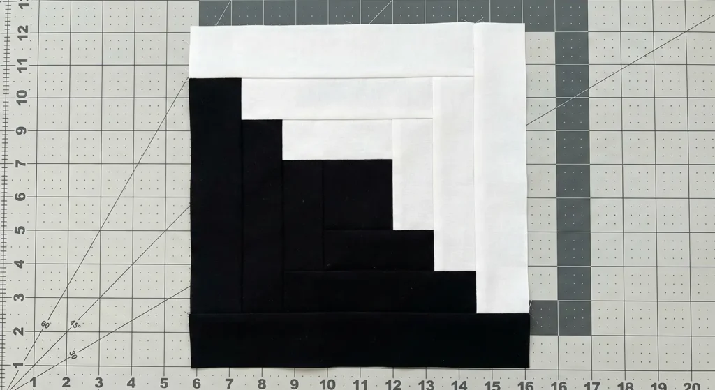 Sophisticated Black and White Log Cabin Quilt Designs with Modern Appeal