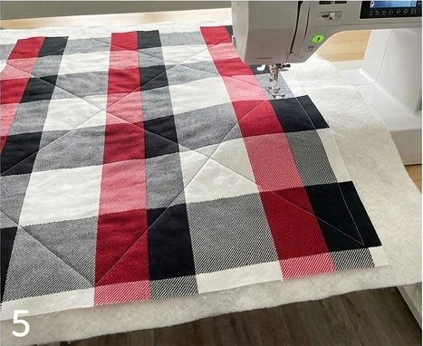Bold Buffalo Check Quilt Throw for Sofa in Living Cum Dining Room