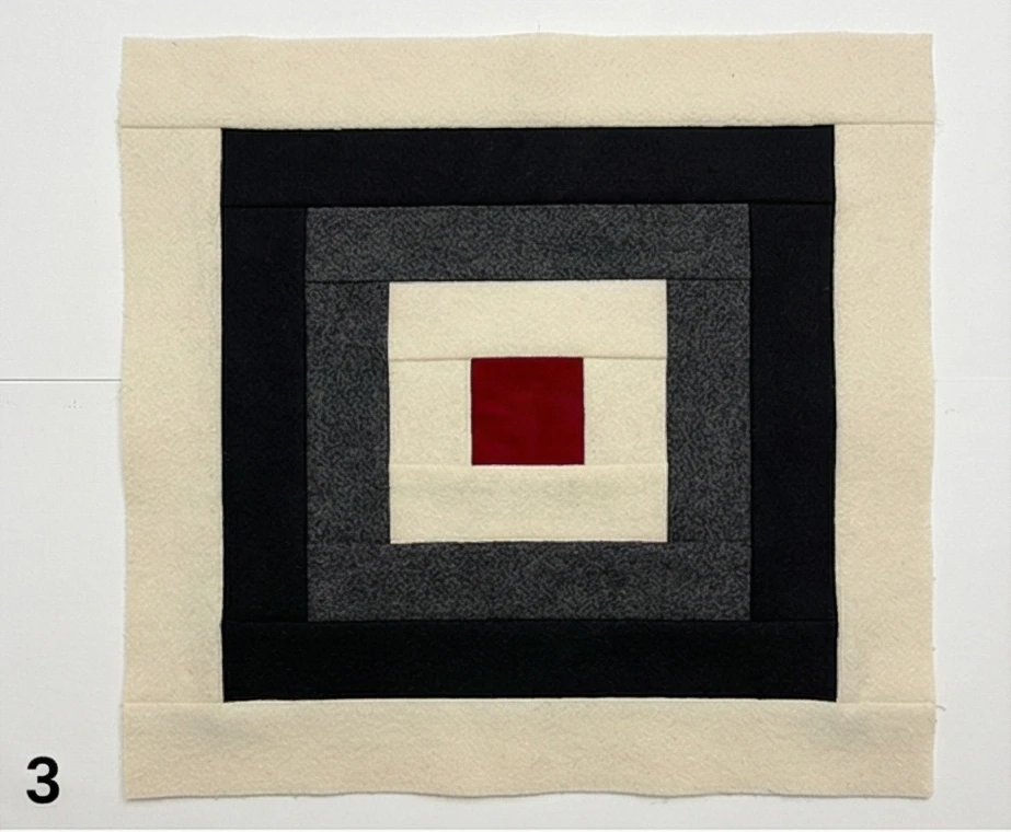 Elegant Black and Cream Wool Quilt Designs for Timeless Decor