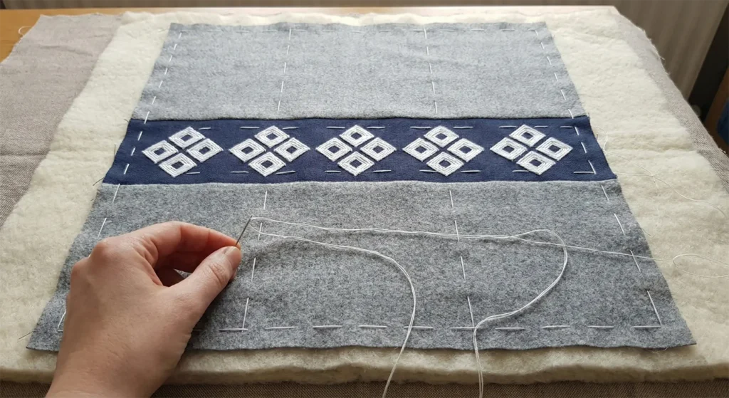 Modern Kogin Embroidery Patterns on Cozy Quilted Throws