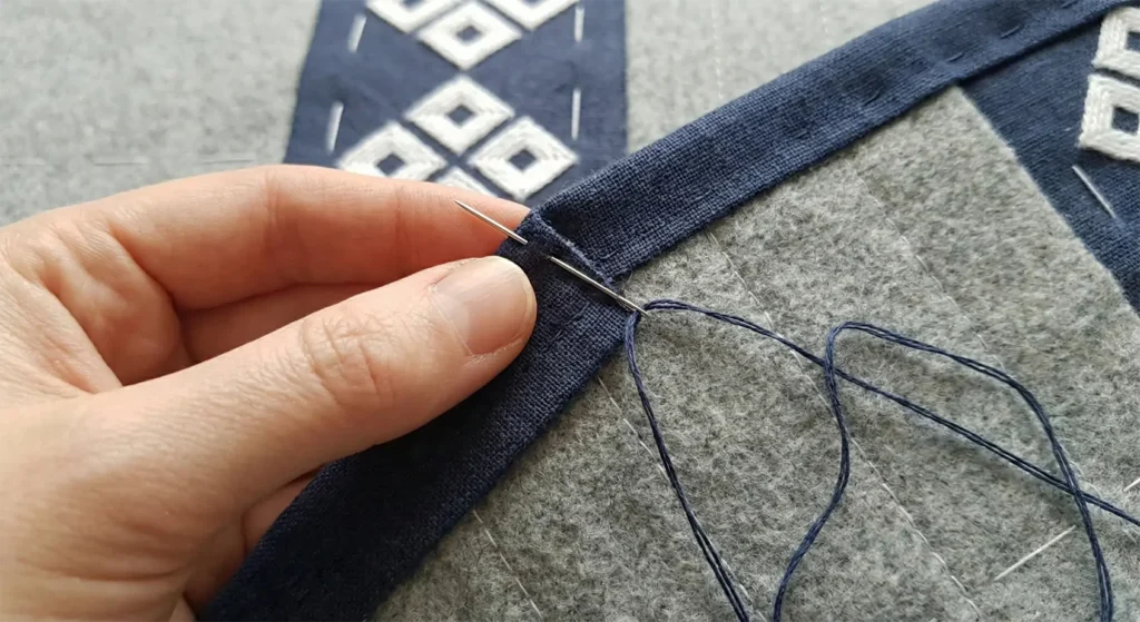 Modern Kogin Embroidery Patterns on Cozy Quilted Throws