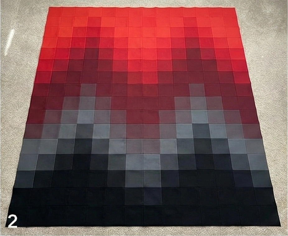 Ombre Red to Black Quilt for Dramatic Sofa Drape in Combined Room