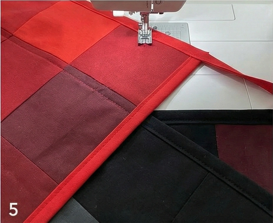 Ombre Red to Black Quilt for Dramatic Sofa Drape in Combined Room