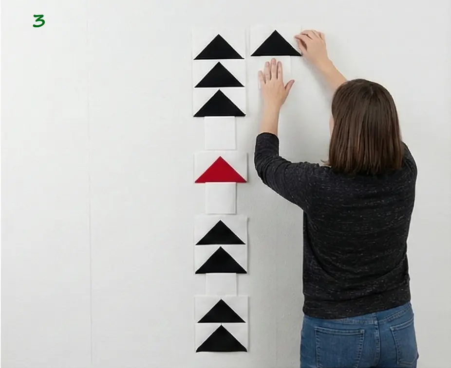 Scandinavian-Inspired Red, Black, and White Quilts for a Minimal Living Room